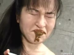 Asian MILF tastes her own poop after shitting on the couch
